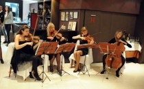 Celebrating the opening of the new plant and NIS String Quartet